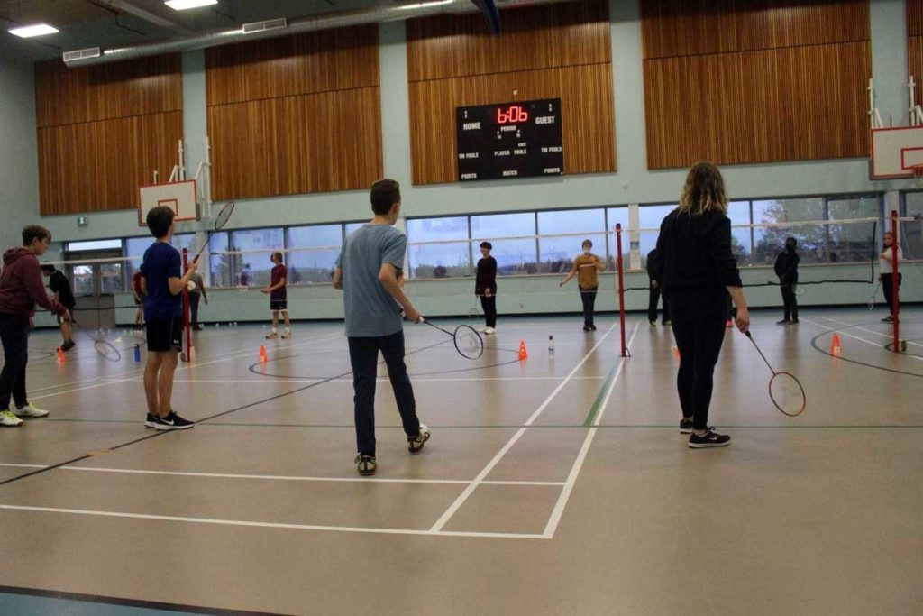 Extra nets provide additional training area but players are separated by pylons six feet apart